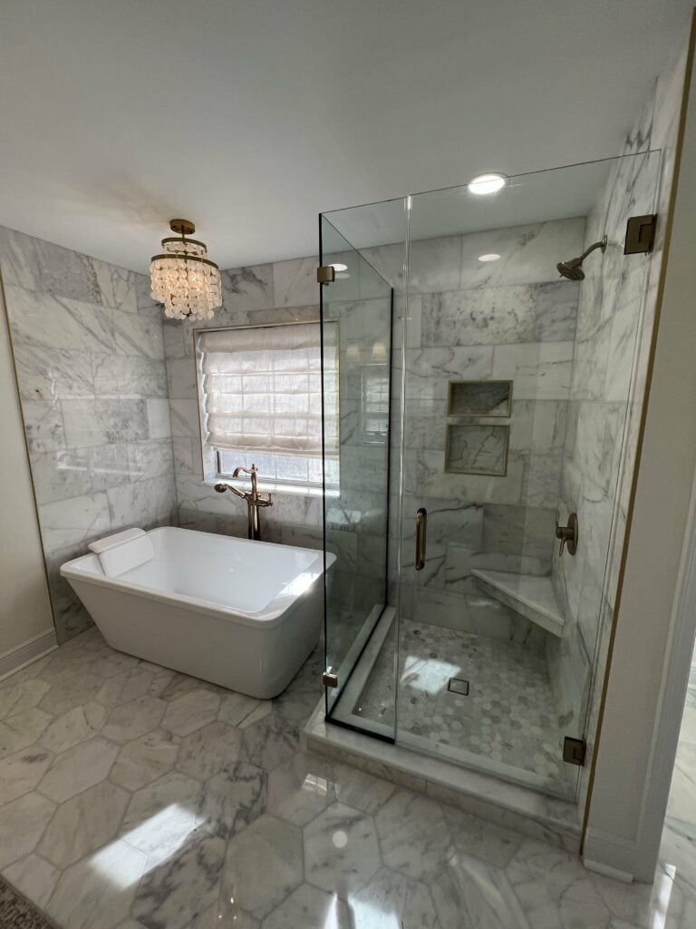 Full view of luxury bathroom with freestanding tub and glass shower
